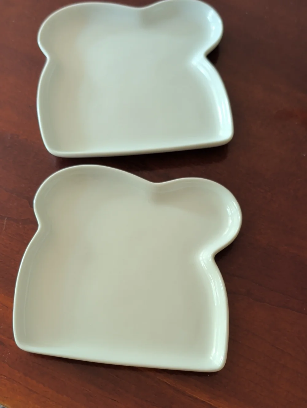 Crate&Barrel Set Of 2 White Ceramic Bread Shaped Plates